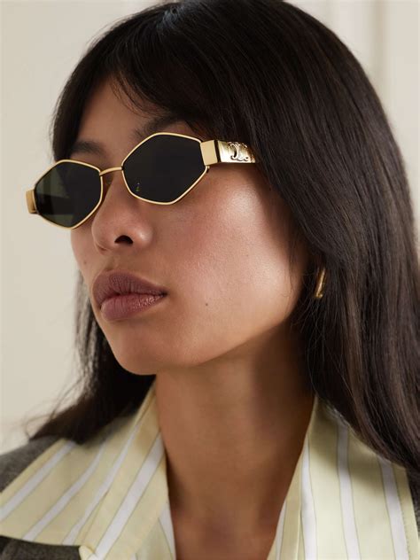 Celine Triomphe Gold Sunglasses from .